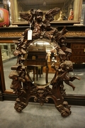 Carved mirror in walnut, Italy 19th century
