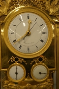 Empire style Calender Clock in gilded bronze, France around 1800