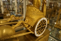 Empire style Chariot clock in gilded bronze, France around 1800