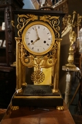Empire style Clock in bronze , France Early 19th Century