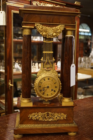 French mahogany mystery portico clock