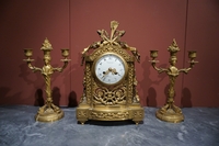 Louis XVI style Clock set in gilded bronze, France 2nd half 19th C.
