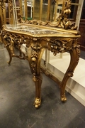 Mirror top console table in gilded wood, Italy first half 20th C.