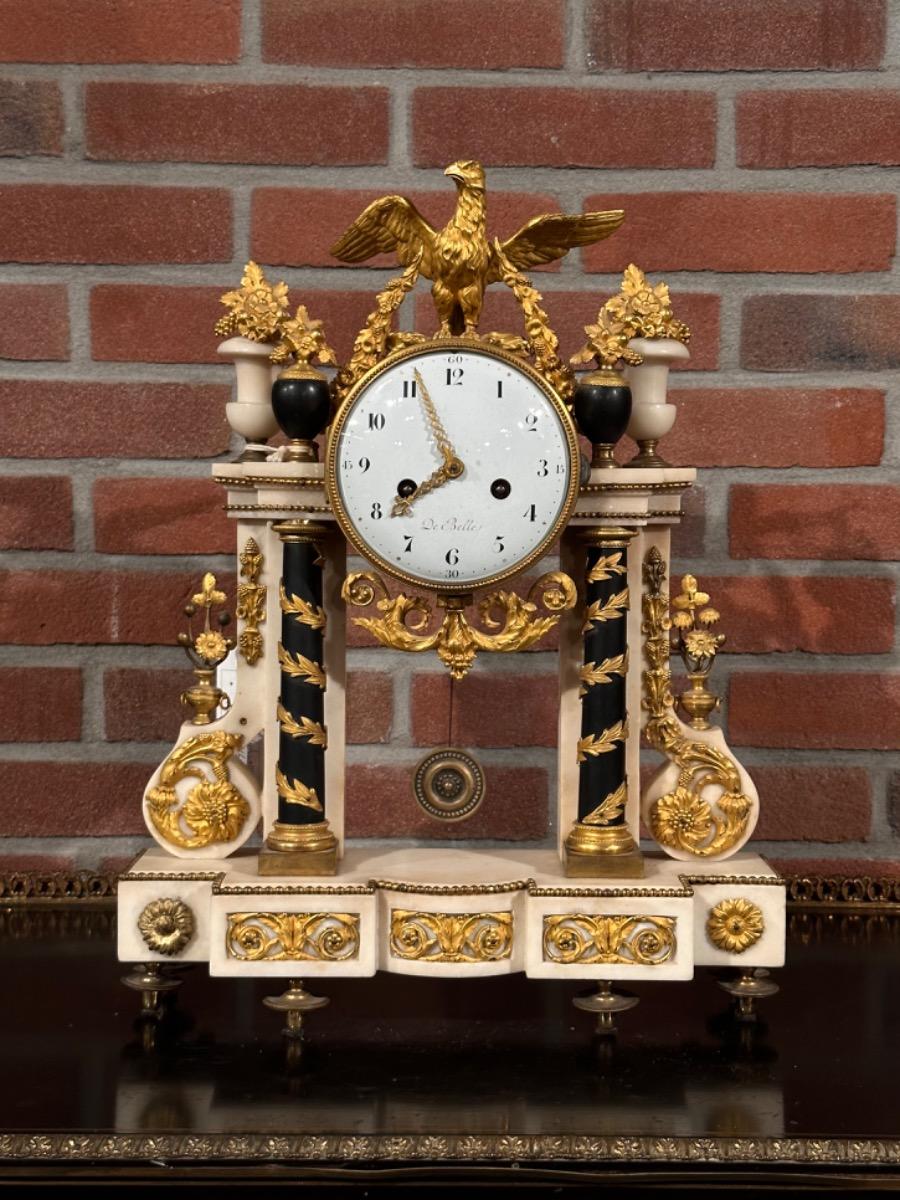 18th century Louis XVI portico clock signed “De Belle”, 36x10x47h cm