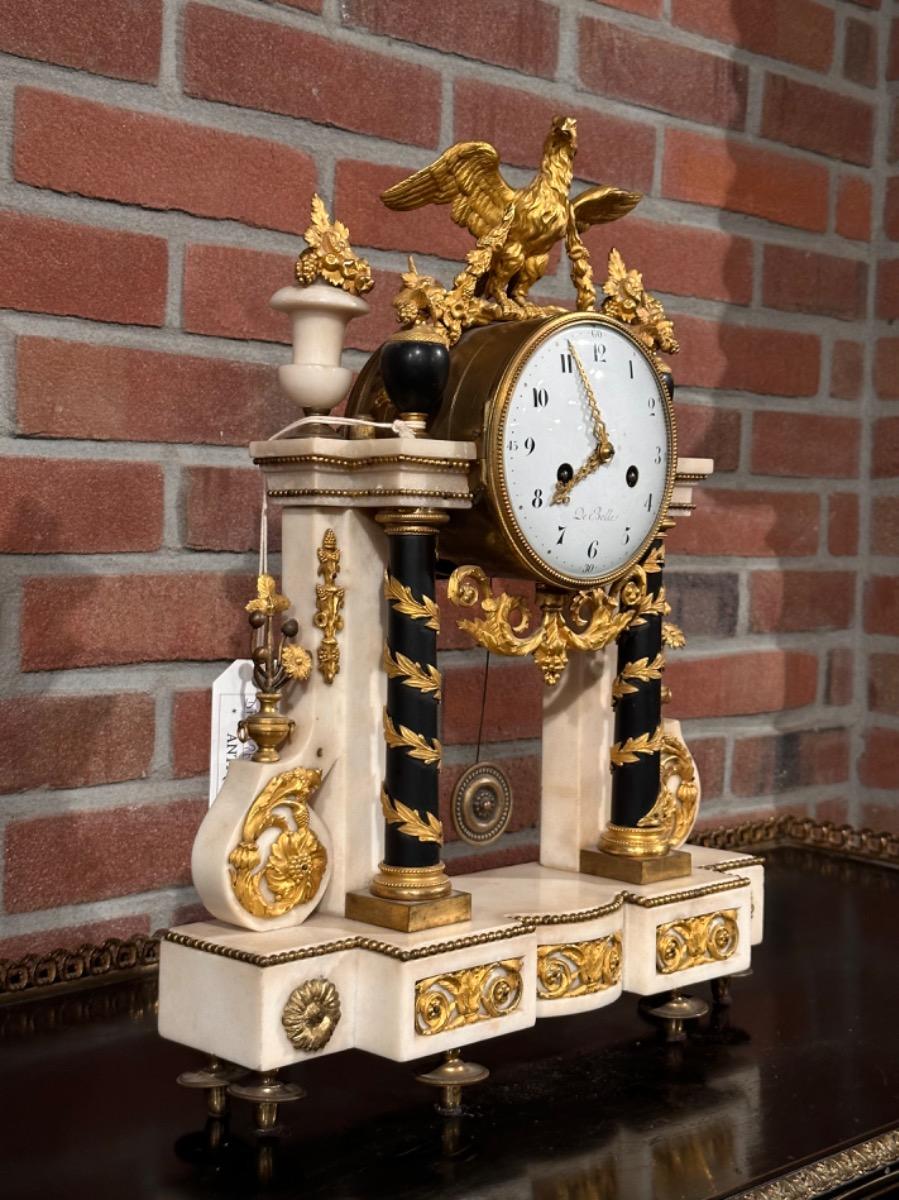 18th century Louis XVI portico clock signed “De Belle”, 36x10x47h cm