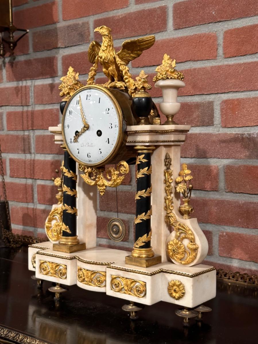 18th century Louis XVI portico clock signed “De Belle”, 36x10x47h cm