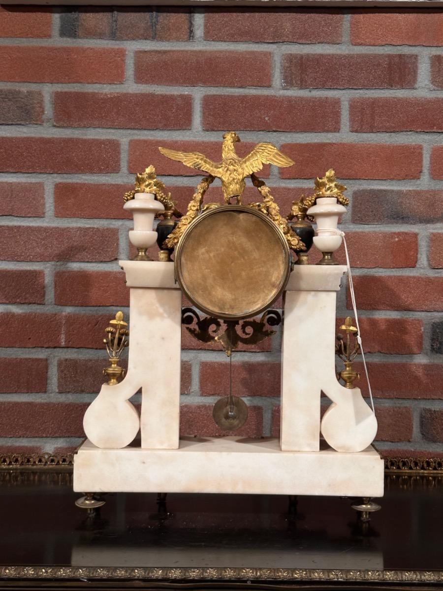 18th century Louis XVI portico clock signed “De Belle”, 36x10x47h cm