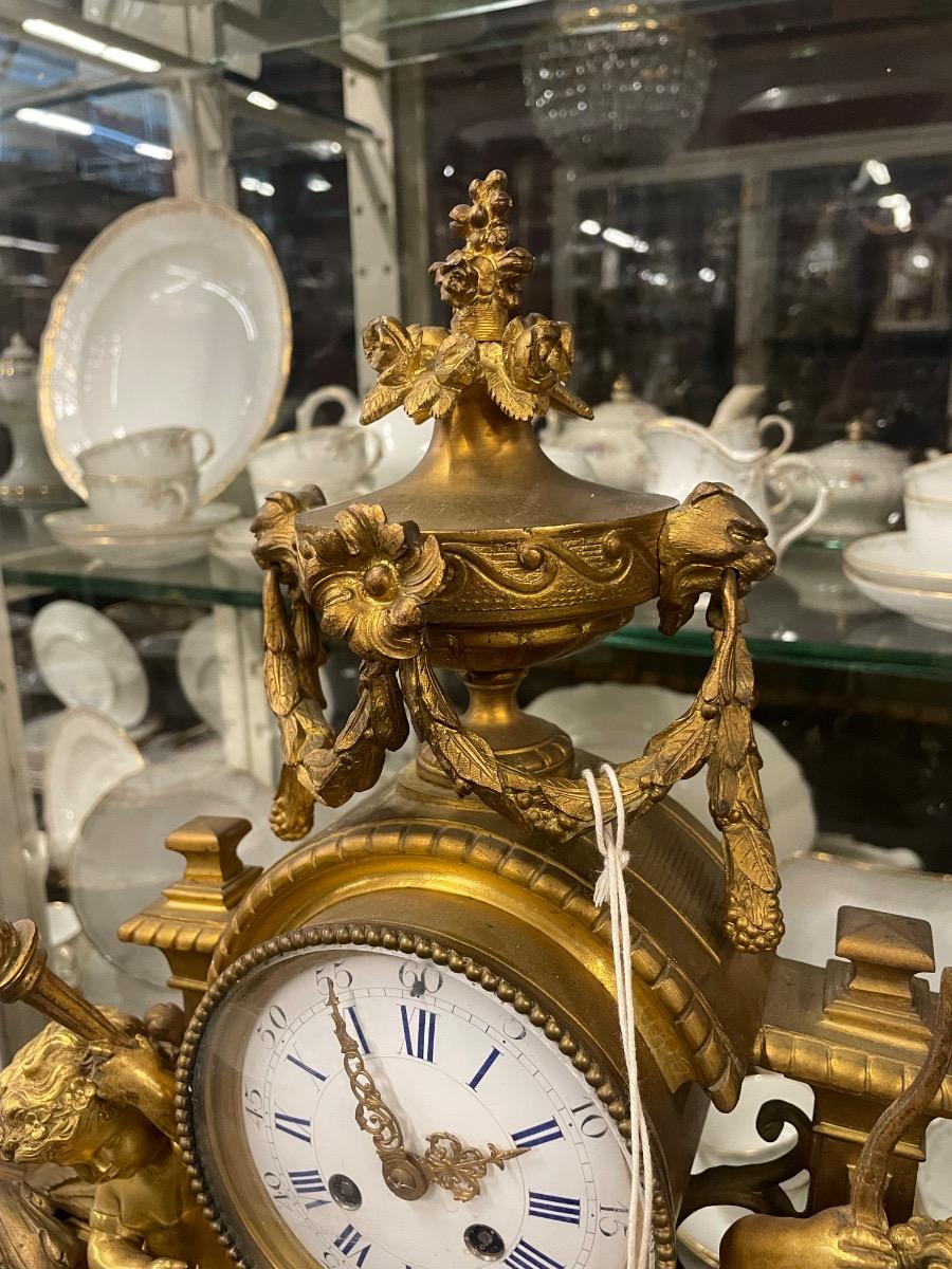 19th century bronze gilded clock. 46w x 46h cm (without wooden console) 