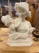 Alabaster sculpture mother with child, signed. 