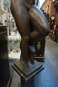 Big bronze nude on marble column Around 1900