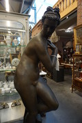 Big bronze nude on marble column Around 1900