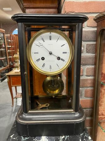 Black marble table clock, circa 1900
