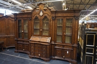 Bookcase in walnut, Italy mid 20th C.