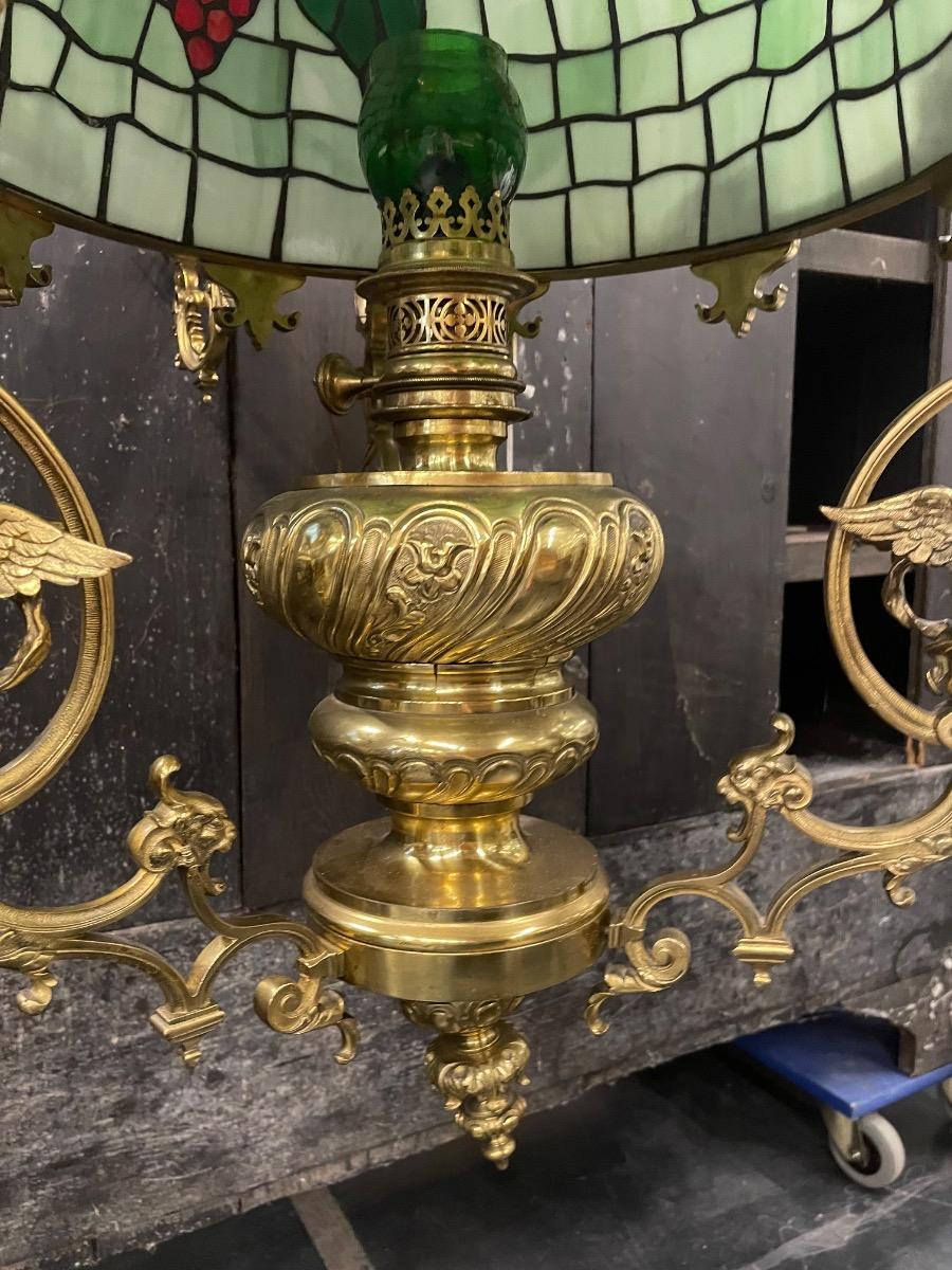 Bronze chandelier with stained glass shade, 125h x 75 cm in diameter 