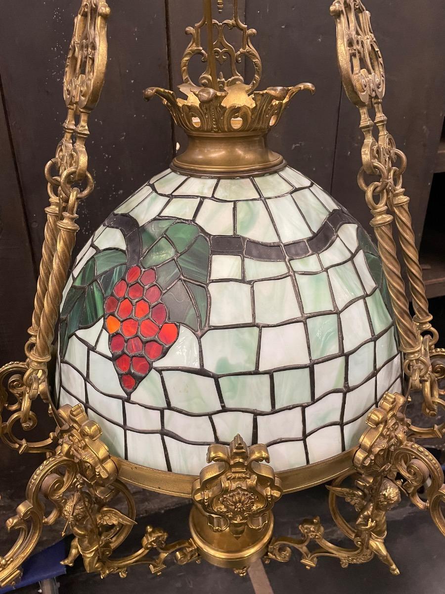 Bronze chandelier with stained glass shade, 125h x 75 cm in diameter 
