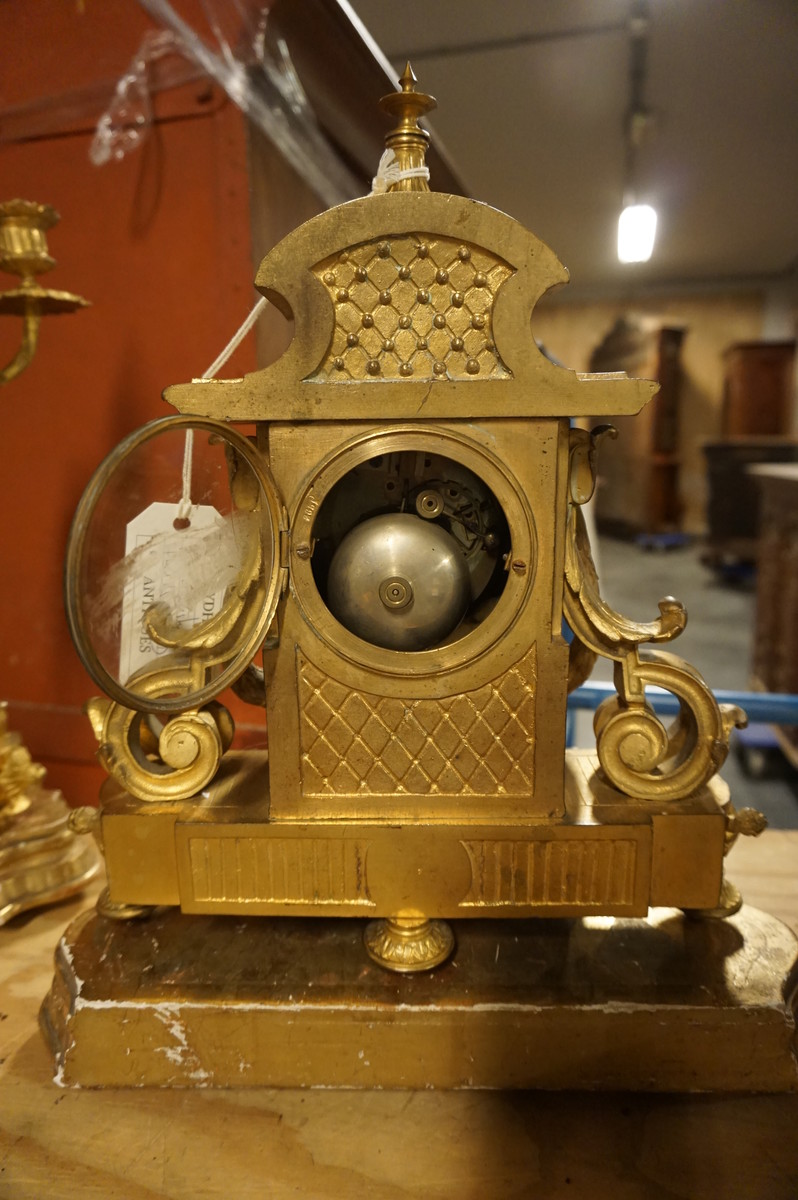 Bronze gilded and alabaster clock set