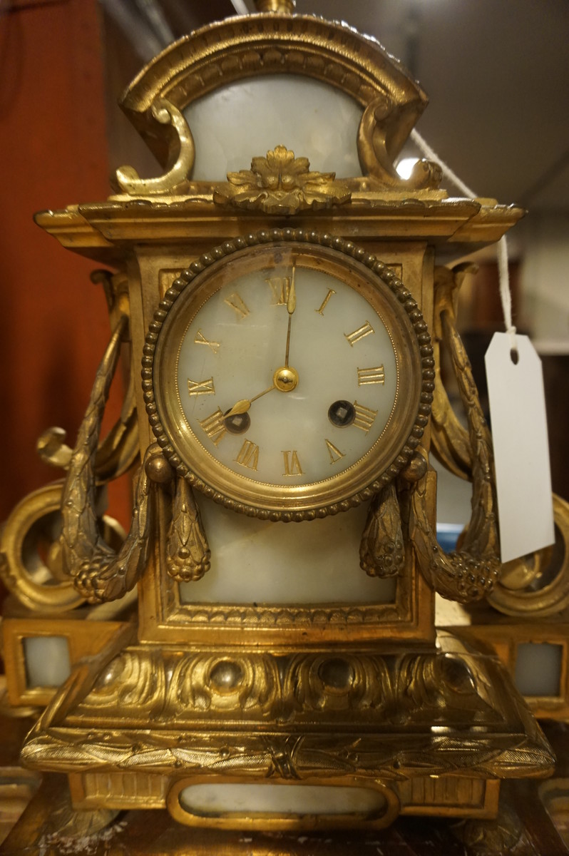 Bronze gilded and alabaster clock set