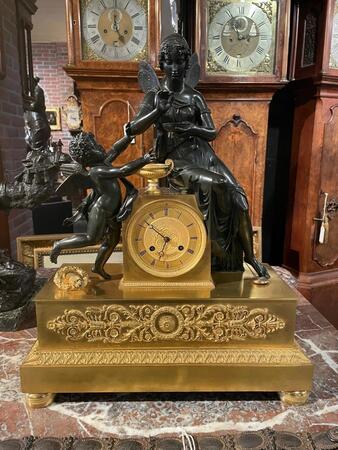 Bronze gilded and patinated Empire clock