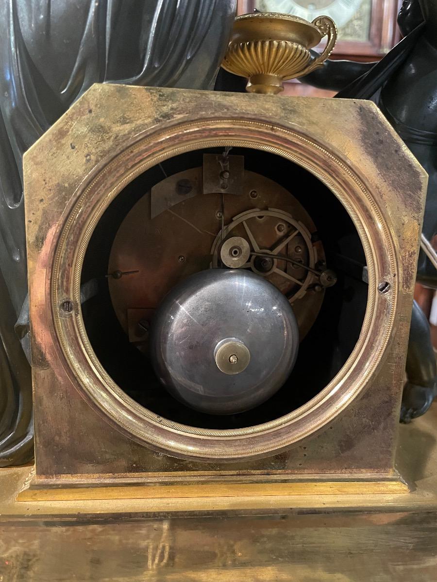 Bronze gilded and patinated Empire clock