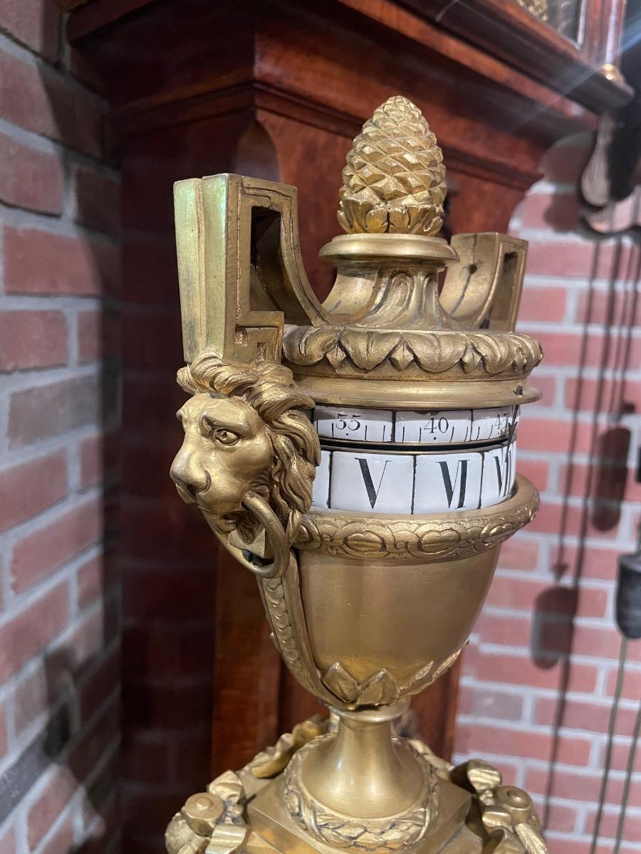 Bronze gilded “circles tournants” tableclock 45 cm tall