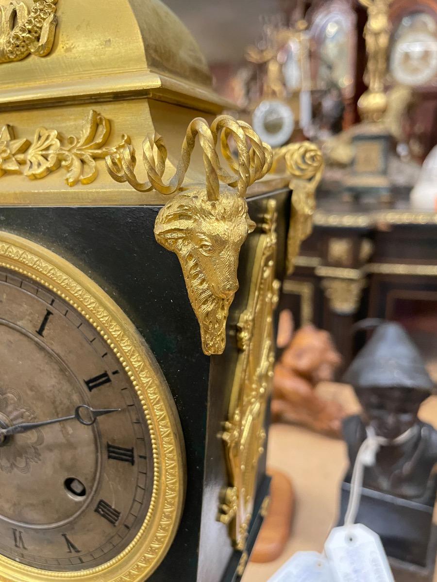 Bronze gilded Empire clock. 46 cm high 