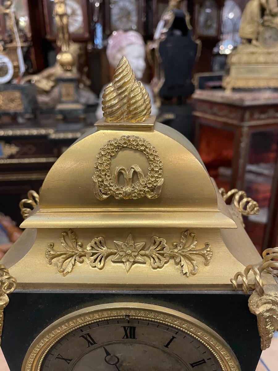 Bronze gilded Empire clock. 46 cm high 