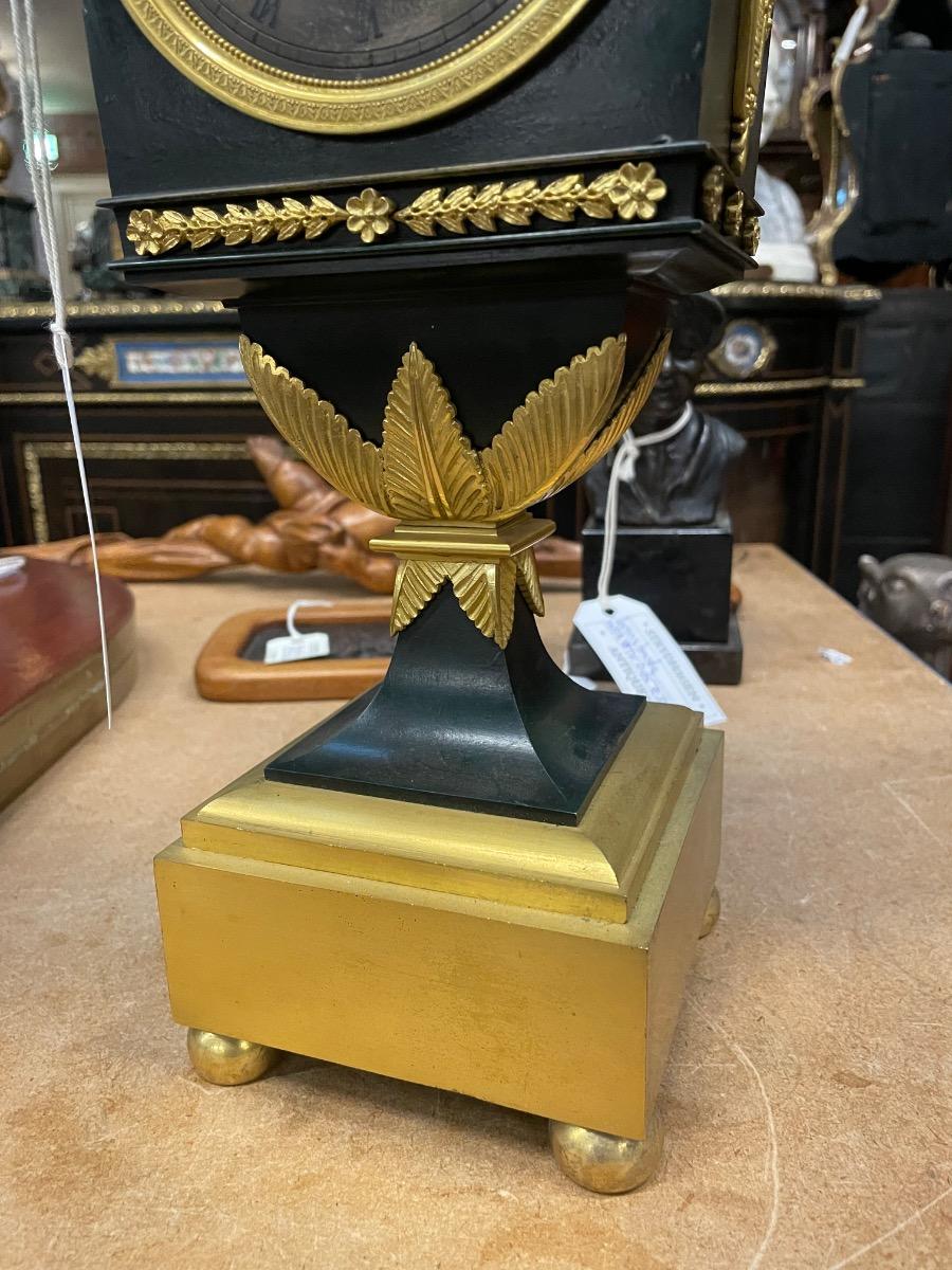 Bronze gilded Empire clock. 46 cm high 