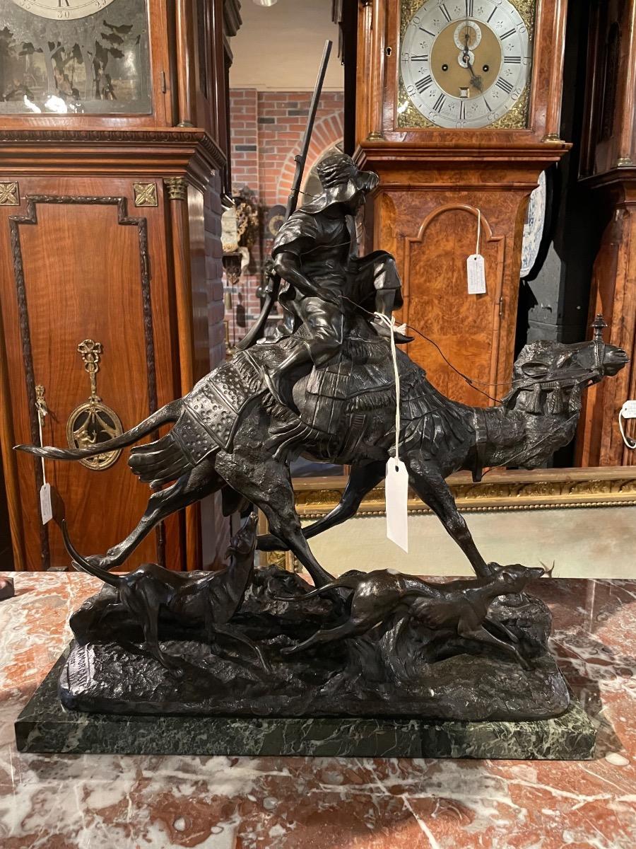 Bronze hunter on dromedary signed by Antonio Amorgasti, dated 1928