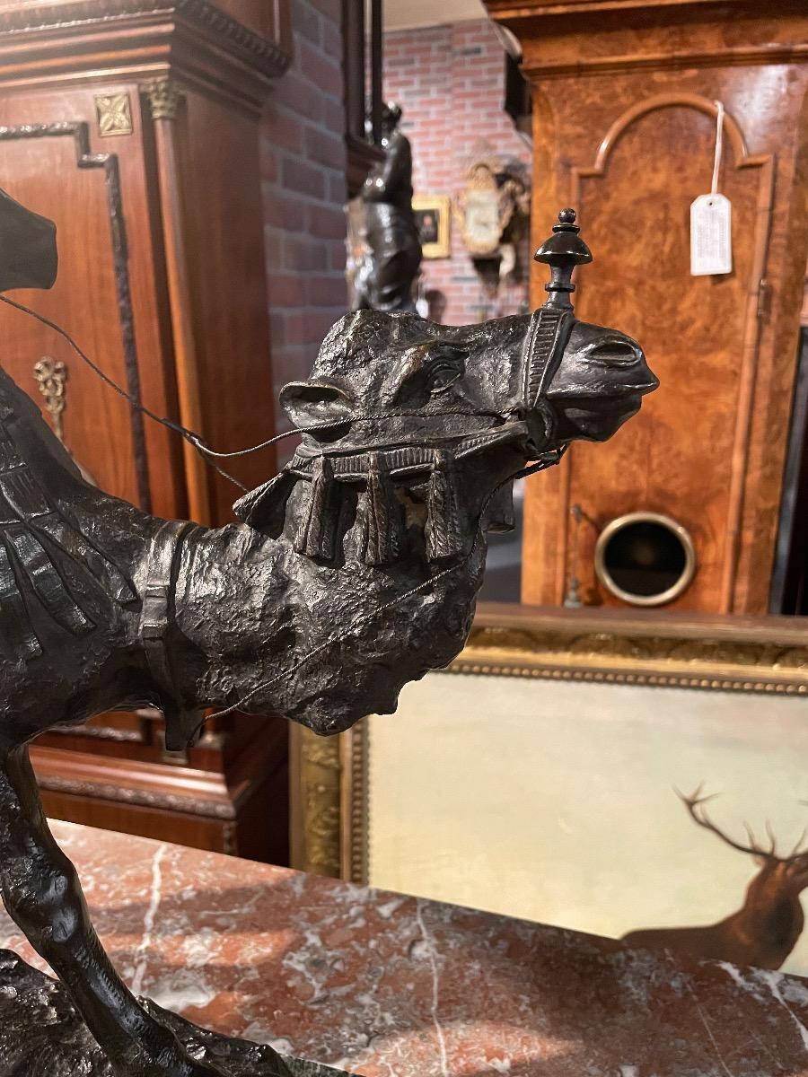 Bronze hunter on dromedary signed by Antonio Amorgasti, dated 1928