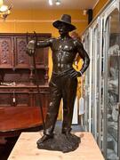 Bronze sculpture of a haymaker / mower signed by G. Devreese, 71h cm