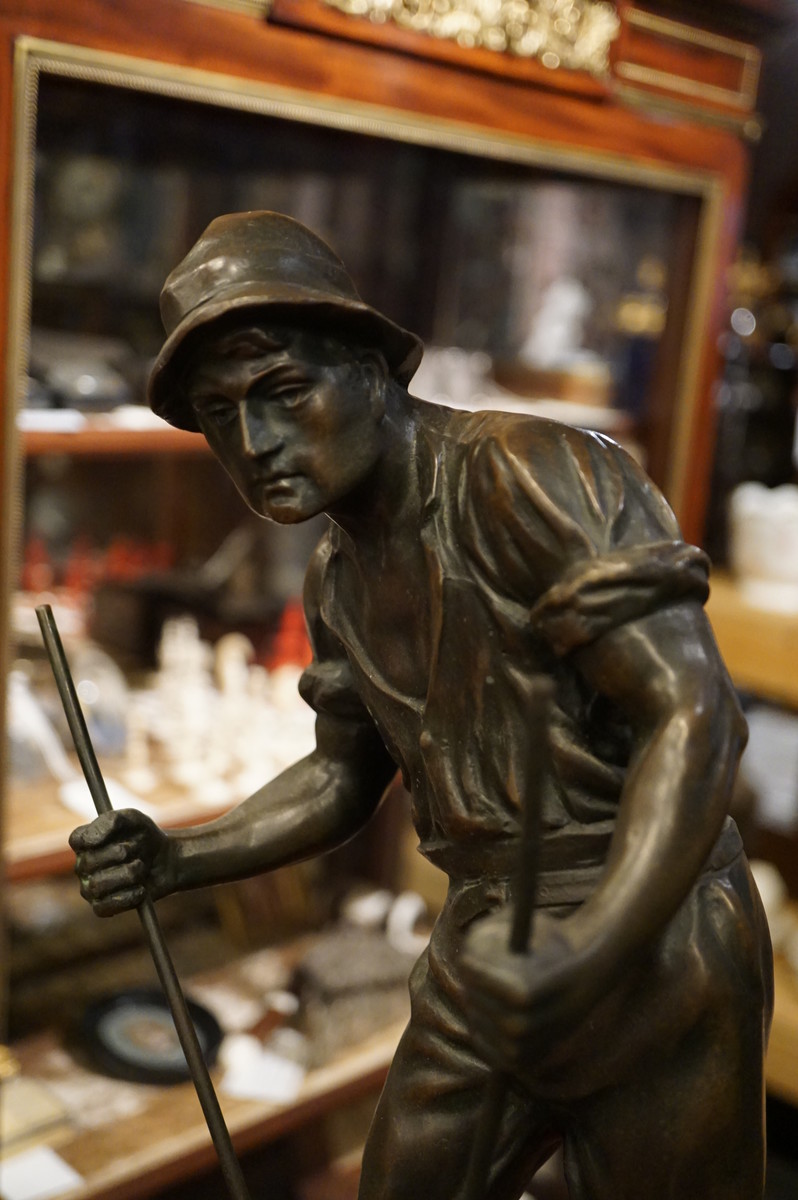 Bronze statue of railway worker, signed