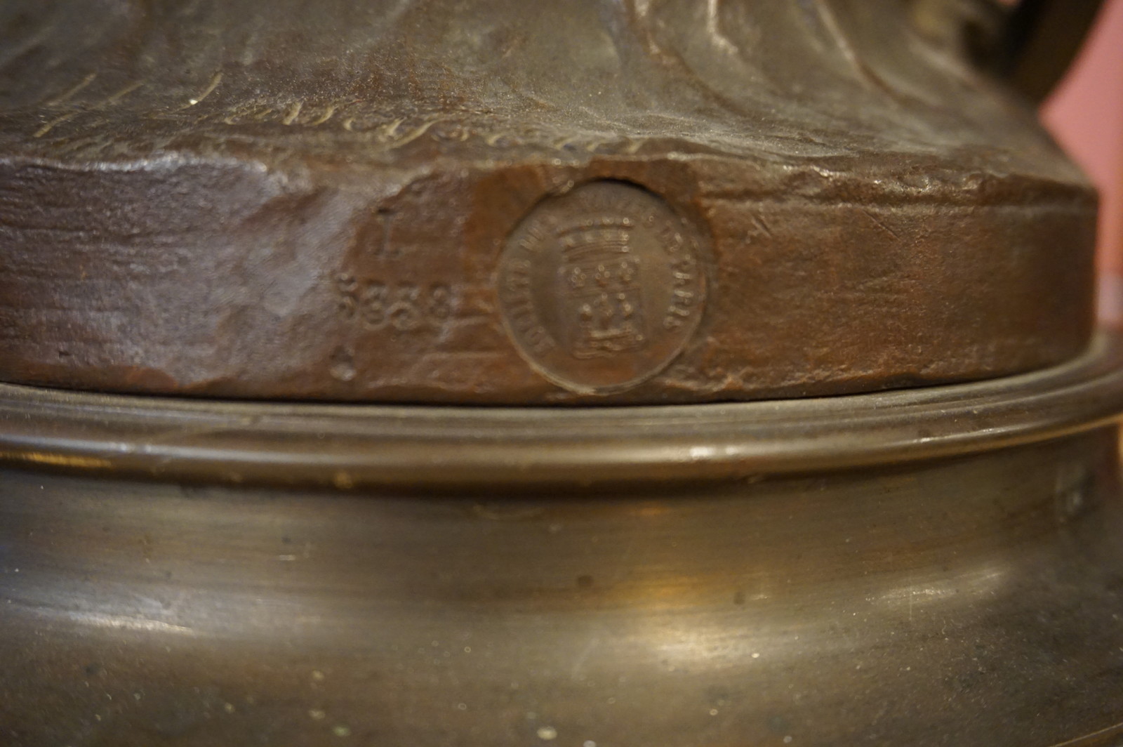 Bronze statue on rotating base signed Levaseur