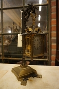 style Carriage clock in stand in bronze, France around 1900