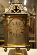 style Carriage clock in stand in bronze, France around 1900