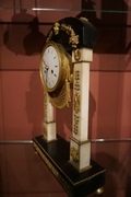 Directoire style Clock in marble, France last part 18th C.