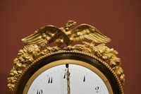 Directoire style Clock in gilded bronze and marble, France last part 18th C.