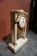 Directoire style Clock in marble, France last part 18th C.