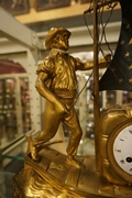 Directoire style Clock Le Matelos in gilded bronze, France around 1800