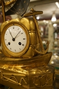 Directoire style Clock Le Matelos in gilded bronze, France around 1800