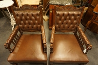 Edwardian pair of armchairs in oak with leather, early 20th C.