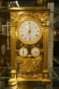 Empire style Calender Clock in gilded bronze, France around 1800