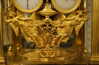 Empire style Calender Clock in gilded bronze, France around 1800