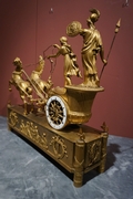 Empire Chariot clock in gilded bronze, France around 1800