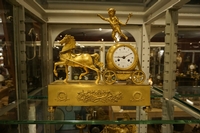 Empire style Chariot clock in gilded bronze, France around 1800