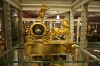 Empire style Chariot clock in gilded bronze, France around 1800