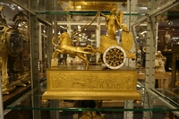 Empire style Chariot clock in gilded bronze, France around 1800