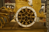 Empire style Chariot clock in gilded bronze, France around 1800