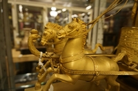 Empire style Chariot clock in gilded bronze, France around 1800