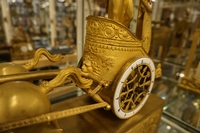 Empire style Chariot clock in gilded bronze, France around 1800