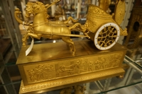 Empire style Chariot clock in gilded bronze, France around 1800